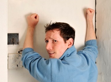 man banging on door