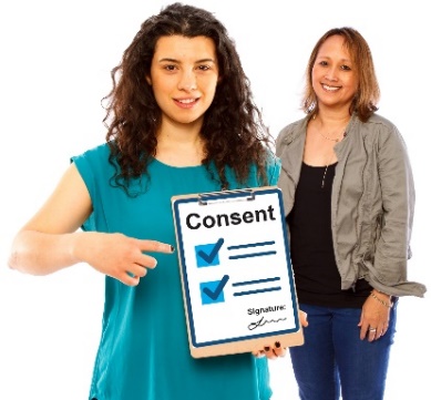 woman pointing at consent form, with woman in the back smiling.