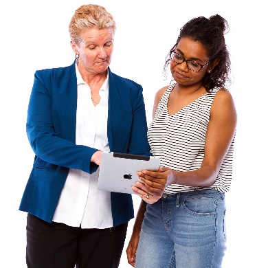 two women looking at a tablet.